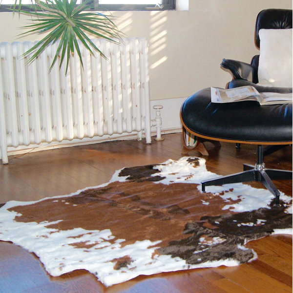 Millwood Pines Meriden Animal Print Machine Made Faux Cowhide Area Rug